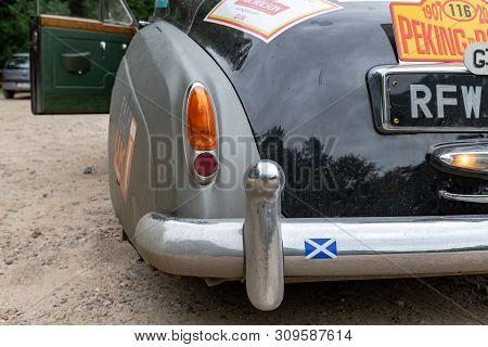 Wiecbork, Kujawsko Pomorskie / Poland - July 3, 2019: Rally Beijing - Paris. The Athlete Repairs The