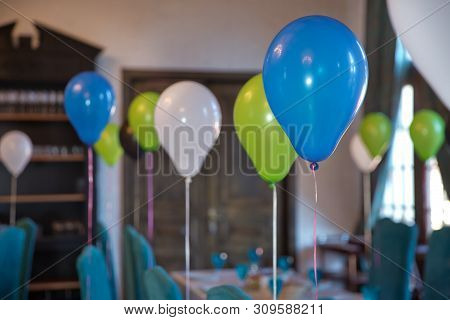 Decorated Balloons For Birthday. View Of An Empty Blue Boyl Baptism Celebration. B Irthday Party Of 