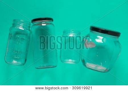 Isolated Glass Jars, Flat And Center On Mint Teal Green Background - Recycling