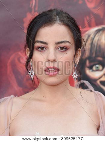 LOS ANGELES - JUN 20:  Katie Sarife arrives to the 'Annabelle Comes Home' World Premiere  on June 20, 2019 in Hollywood, CA