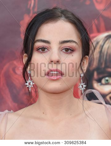LOS ANGELES - JUN 20:  Katie Sarife arrives to the 'Annabelle Comes Home' World Premiere  on June 20, 2019 in Hollywood, CA