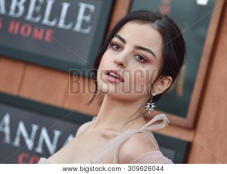LOS ANGELES - JUN 20:  Katie Sarife arrives to the 'Annabelle Comes Home' World Premiere  on June 20, 2019 in Hollywood, CA