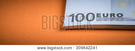 Euro Cash On A Pink And Orange Background. Euro Money Banknotes. Euro Money. Euro Bill. Place For Te