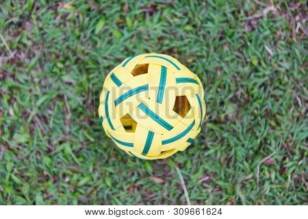Sepak Takraw Ball On Green Grass Field / Rattan Ball Sport Outdoor