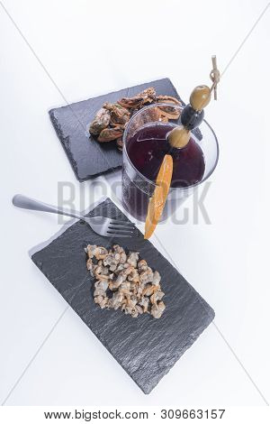 Selective Focus Of A Homemade Vermouth And Seafood Appetizer. Spanish Traditional Appetizer