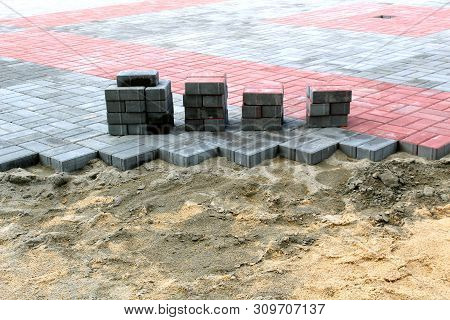 Stack Of  Pavement Stones At The Site Of The Road Works. Construction And Repair Of The Sidewalk.