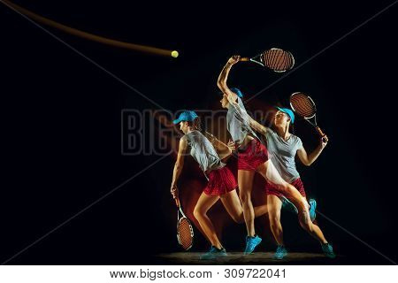 One Caucasian Woman Playing Tennis Isolated On Black Background In Mixed And Stobe Light. Fit Young 