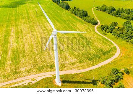 Producing Electrycity In Rural Area. Renewable Energy Concept. Aerial Landscape