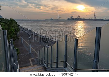 Osaka Bay With Yumeshima Island On Background In Summer Sun Set Time, View From Osaka Metro Cosmosqu
