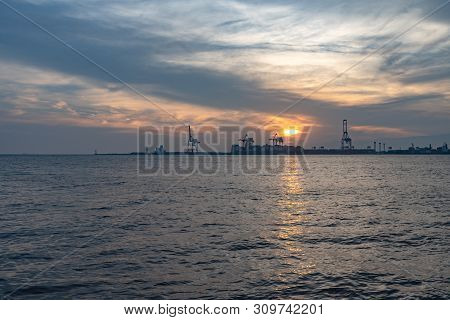 Osaka Bay With Yumeshima Island On Background In Summer Sun Set Time, View From Osaka Metro Cosmosqu