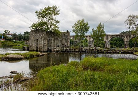 Amares, Portugal - June 20, 2019 : Ruins Of A Mill On The Green Banks Of The River Cávado In Braga, 