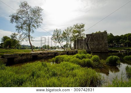 Amares, Portugal - June 20, 2019 : Ruins Of A Mill On The Green Banks Of The River Cávado In Braga, 