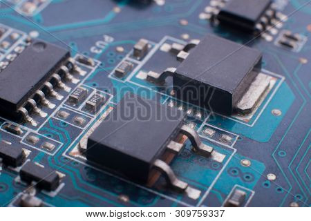 Chips And Capacitors On The Board Close-up