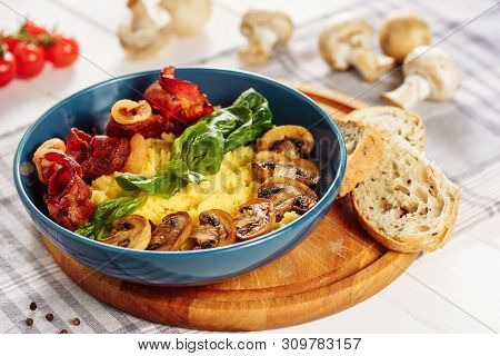 Polenta Italian Corn Porridge Pork Bacon Dish. Traditional Healthy Breakfast With Mushroom In Bowl A