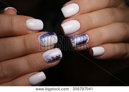 Multi-colored Pastel Manicure Combined Tone On Tone With A Striped Background.nail Art