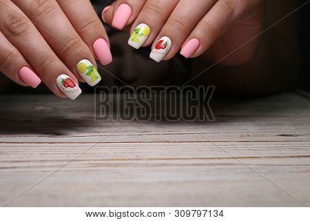 Multi-colored Pastel Manicure Combined Tone On Tone With A Striped Background.nail Art