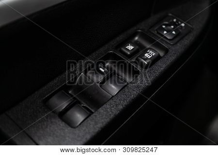 Novosibirsk, Russia - June 28, 2019: Mitsubishi Galant,close-up Of The Side Door Buttons: Window Adj