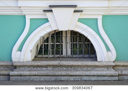 The Basement Window With A Metal Barrier