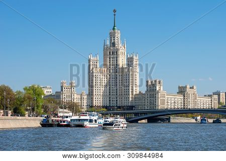 Moscow, Russia - May 6, 2019: A View Of The High-rise On Kotelnicheskaya Embankment And A Lot Of Ple