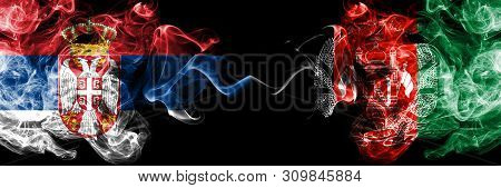 Serbia Vs Afghanistan, Afghani Smoky Mystic Flags Placed Side By Side. Thick Colored Silky Smokes Co