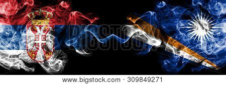Serbia Vs Marshall Islands Smoky Mystic Flags Placed Side By Side. Thick Colored Silky Smokes Combin