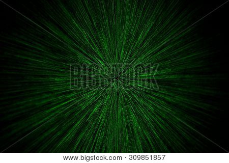 Natural Lens Zoom Explosion Radial Blurred Green Particles On Black Background With Selective Focus