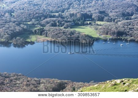 Beautiful Autumn Fall Landscape Image Of View From Gummers How Down Onto Derwent Wter In Lake Distri