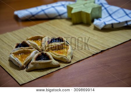 Hamantash Purim Blueberry And Apricot Jam Cookies With Wooden Table Background And David Star Shape