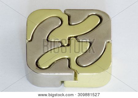 Cast Iron Puzzle In The Shape Of A Square