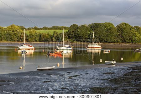 Boats Moored On The River Teifi In Cardiganshire,wales;, Uk