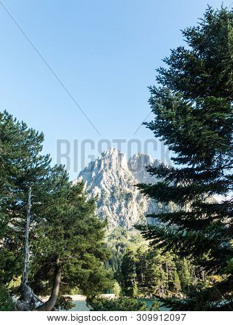 Pond Of Sant Maurici, In The Aiguestortes And Sant Maurici National Park. The Peak Amitges On Backgr