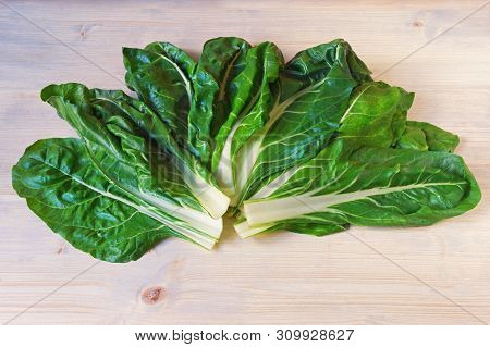 Balkan Cuisine. Blitva ( Chard Leaves ) - Popular Leafy Vegetables - On Rustic Background