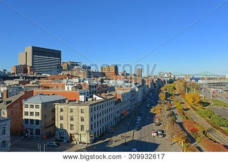 Montreal, Canada - Nov 2, 2012: Aerial View Of Old Port And Jacques Cartier Bridge On St Lawrence Ri