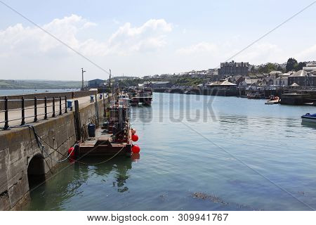 Pretty Padstow Harbour In Cornwall. Padstow Is A Town, Civil Parish And Fishing Port On The North Co