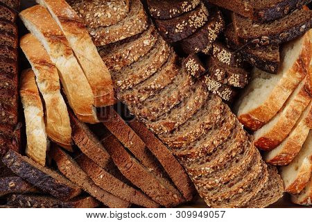 Fresh Bread Slice Mix Flat Lay Bakery Background. Different Variety Grain Bun Piece White And Brown 