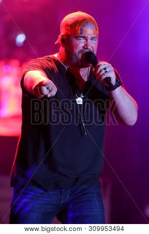 FARMINGVILLE, NY - JUL 3: Lee Brice performs in concert at The Fest at Long Island Community Hospital at Bald Hill on July 3, 2019 in Farmingville, New York.