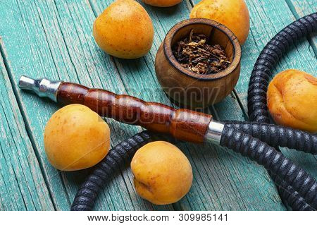 Smoking Arab Hookah With Apricots