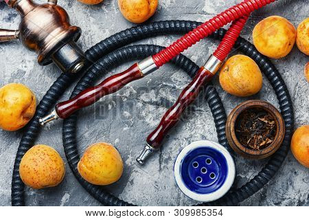 Smoking Arab Hookah With Apricots