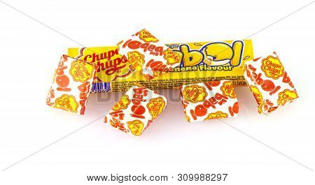 Kamchatka, Russia - 26 May 2018: Yellow Chupa Chups Candy On White Background