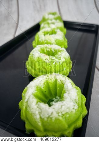 Steamed Rice Cake With Desiccated Coconut On Top. Locally Known As Apam Nasi Or Apam Beras. Selectiv