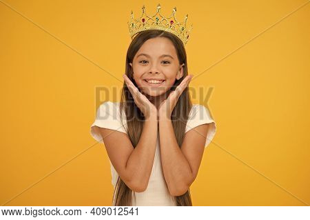 Compelling Baby. Kid Wear Golden Crown Symbol Of Princess. Girl Cute Baby Wear Crown Yellow Backgrou