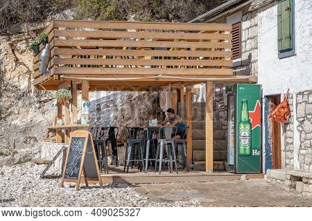 Vis, Croatia - Aug 17, 2020: The Only Restaurant In Stiniva Shlerted Cove Beach In Summer