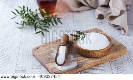 Natural Sweetener In A Wooden Spoon. Sugar Substitute. Erythritol