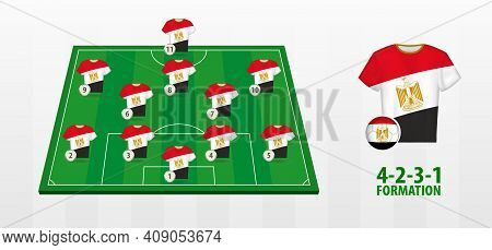 Egypt National Football Team Formation On Football Field. Half Green Field With Soccer Jerseys Of Eg