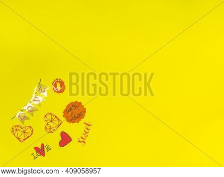 Concept For Love Stories And For Valentines Day. Gift Box In The Form Of A Heart On A Yellow Backgro