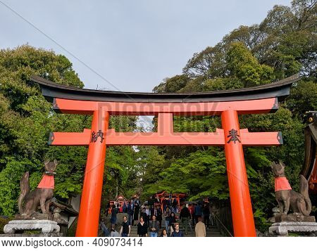 Kyoto, Japan - April 5, 2018: The Incarnation Of The Goddess Inari Is A Fox, Fushimi Inari Temple In