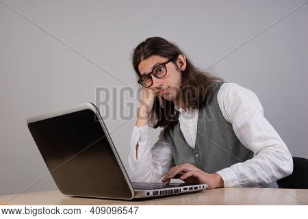 Geek Guy Is Trying To Write Code Or Learn A New Programming Language, Experience Difficulties In The