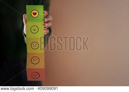 Customer Experience Concept. Happy Client Giving Positive Review On Fold Paper. Feedback Icon From P