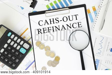 Text Cahs-out Refinance In Notebook On White Table With Office Tools.