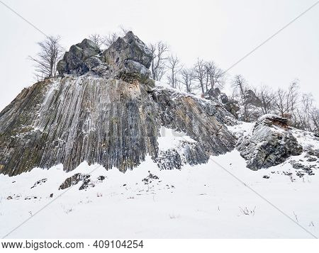 Volcano Rock Formation Zlaty Vrch Built Pentagonal And Hexagonal Basalt Columns. Looks Like Giant Or